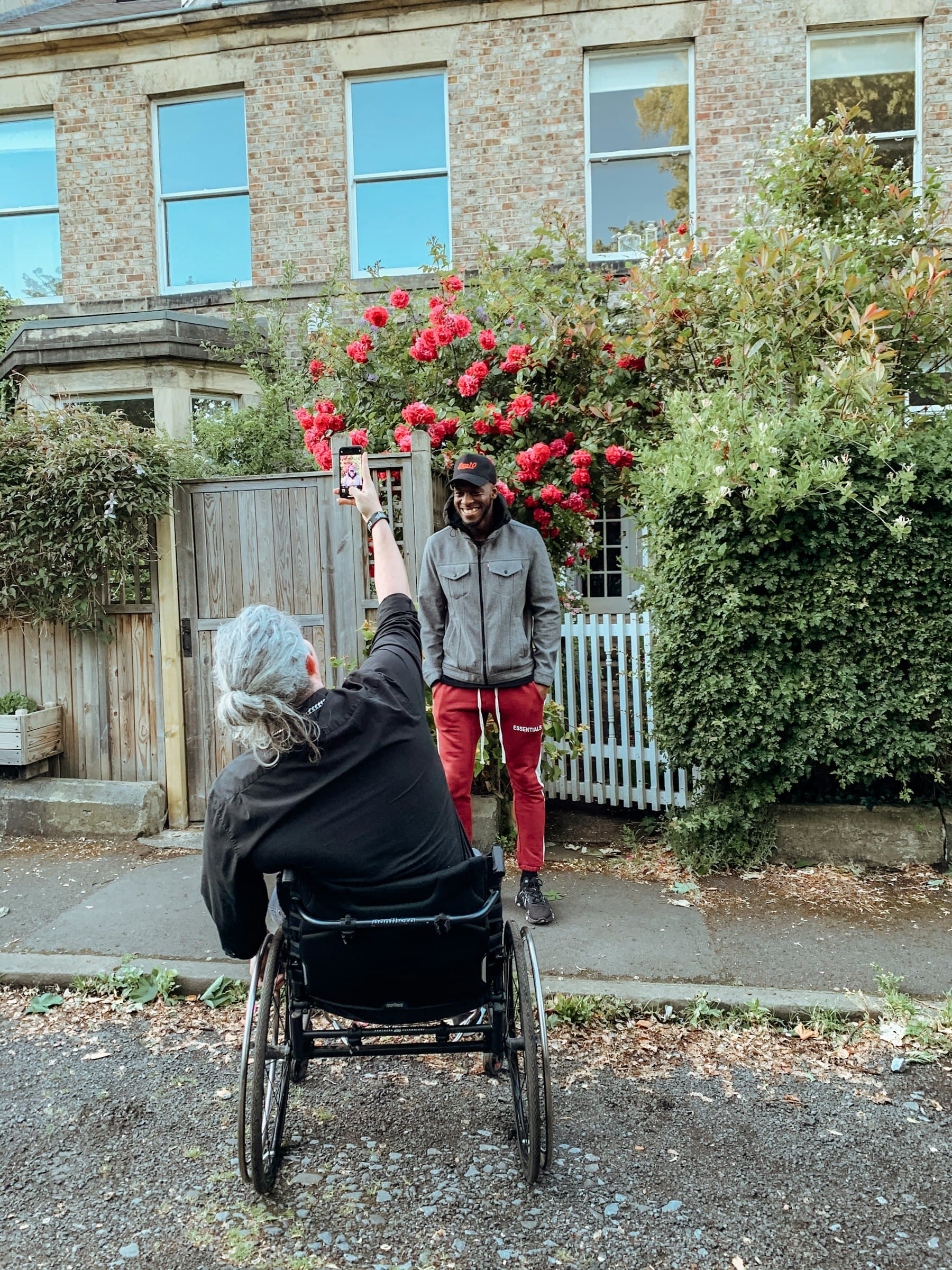 A woman using a wheelchair in a garden
